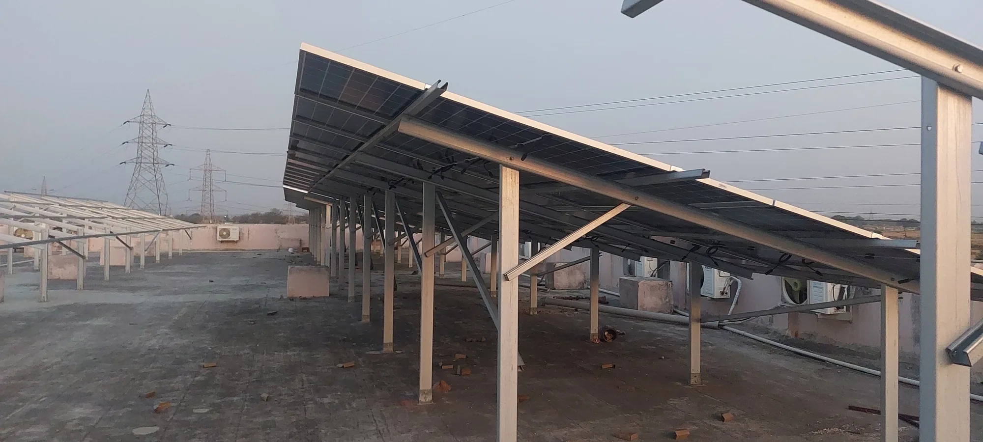 800 kW elevated rooftop array at United Group of Institutions, Prayagraj