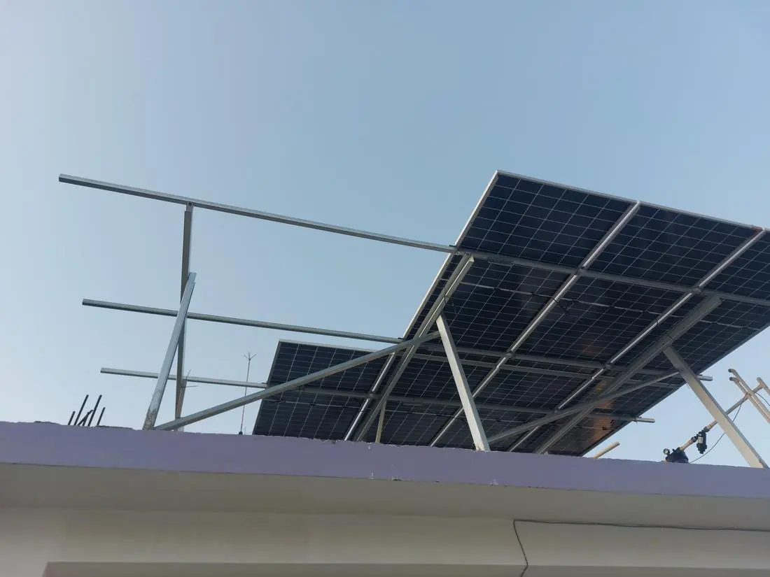 Modules along a rooftop parapet