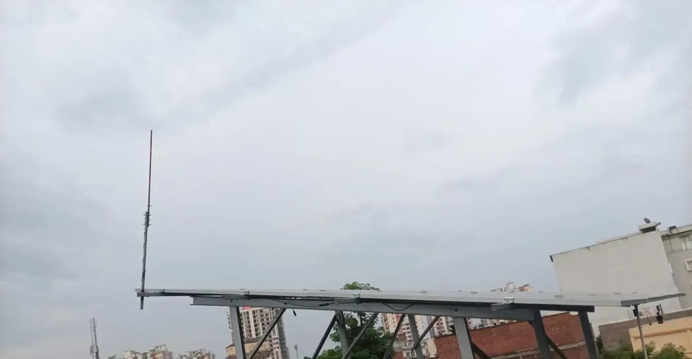 Elevated solar structure above a house roof