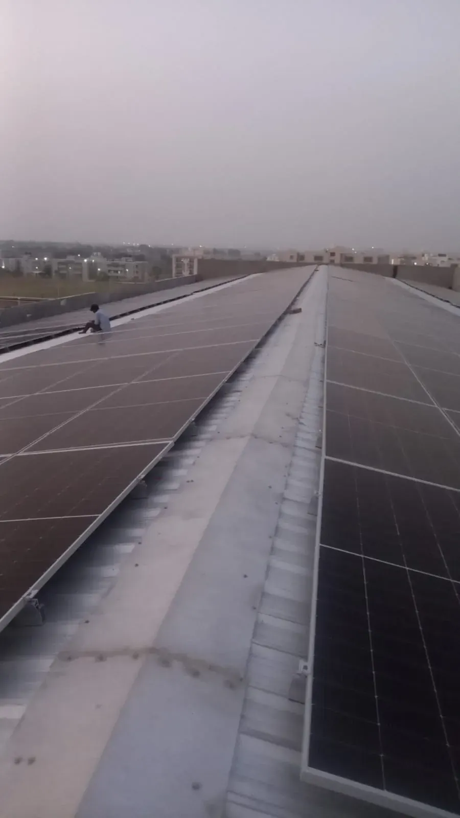 Module rows running along a metal sheet roof